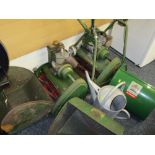 TWO PETROL LAWNMOWERS with associated grass collection boxes and a galvanized watering can