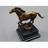 BRONZART SCULPTURE titled 'Galloping Stallion', signed 'Kim B' product code 503, mounted upon a