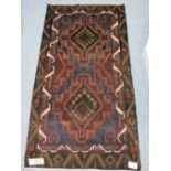 OLD BALUCHI - multi dark tonal colours with a double block central pattern, the edge highlighted