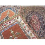 THREE ANTIQUE STYLE WOOLLEN RUGS/RUNNERS, various measurements