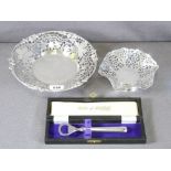 SILVER - bonbon dishes, one 21cms diameter, the other 12cms diameter and a cased silver handled