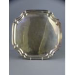 SILVER SALVER, Sheffield 1939, Maker Emile Viner, 26.5cms sq with raised edge on four curled feet,