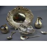 SMALL SILVER GROUP including a pierced swing handled sweet meat dish, Birmingham 1908, an embossed