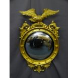 REPRODUCTION REGENCY STYLE CONVEX WALL MIRROR, bobble decorated frame with leaf swags and eagle