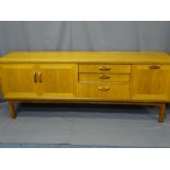 EXCELLENT G-PLAN LONG TEAK SIDEBOARD having three centre drawers with flanking drop down and opening