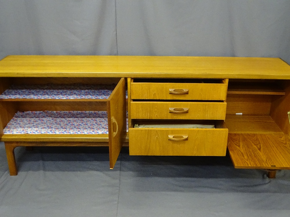 EXCELLENT G-PLAN LONG TEAK SIDEBOARD having three centre drawers with flanking drop down and opening - Image 2 of 4