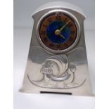 LIBERTY & CO PEWTER & ENAMEL CLOCK, designed by Archibald Knox, 12cms H, of tapering out form with