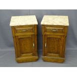 PAIR OF CONTINENTAL OAK MARBLE TOP BEDSIDE CABINETS, 73.5cms H, 40.5cms W, 39cms D