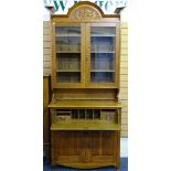 OAK ARTS & CRAFTS SECRETAIRE BOOKCASE, the twin glazed door top section with interior adjustable