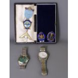 THREE MASONIC JEWELS and two gent's wristwatches, the enamel to one badge marked 'Royal Masonic
