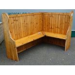 REPRODUCTION PINE CORNER SETTLE with shaped ends, 131cms H maximum, 185.5cms and 122cms the