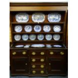 CIRCA 1840 NORTH WALES BREAKFRONT DRESSER in oak and pine, the three shelf rack with wide backboards