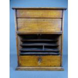 WOODEN DESKTOP STATIONERY CABINET having roller shutter front and drawer with contents