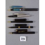 PENS - two Mabie Todd and a Waterman Ideal with nine carat gold band ETC