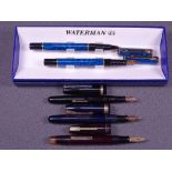 WATERMAN - Two vintage 1940s black Waterman Emblem fountain pens with gold trim and 14ct gold
