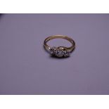 EIGHTEEN CARAT GOLD THREE STONE DIAMOND RING, 0.50 carat central stone with two further 0.20 outer