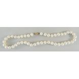 LADIES PEARL NECKLACE having 9ct gold spiral design clasp, 45cms long