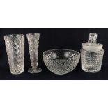 CUT GLASS including four items including a Waterford tapering vase and a Waterford jar and cover