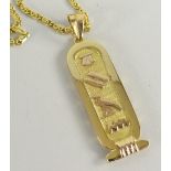 18CT YELLOW GOLD CHAIN with 18ct yellow gold cartouche pendant with Egyptian hieroglyphs, 20gms