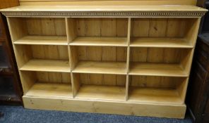 PINE THREE SHELF LOW BOOKCASE with two divisions, dental cornice, 175 x 34 x 110cms