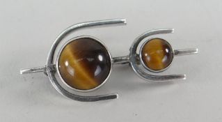 SWEDISH SILVER BAR BROOCH set with two tigers eye stones, dated for 1966, maker's initials V G