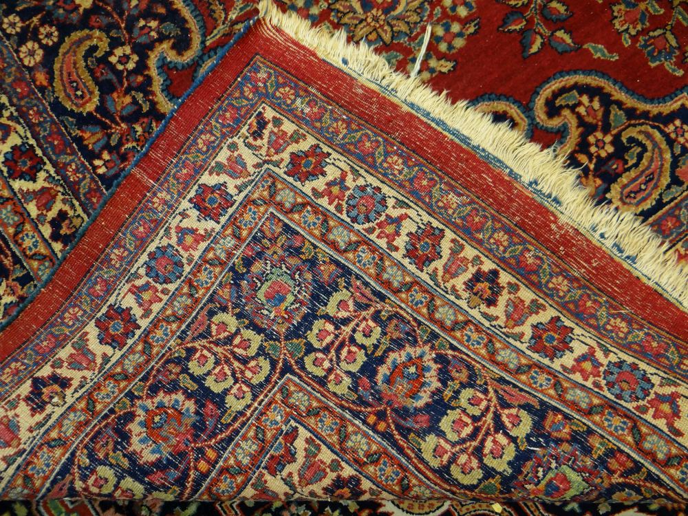 TABRIZ RUG with blue arabesque medallion and spandrels on red palmette ground, multiple borders - Image 3 of 3