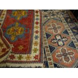 TWO RUGS comprising Kazak Karochov and a Caucasian rug, largest 209 x 132cms