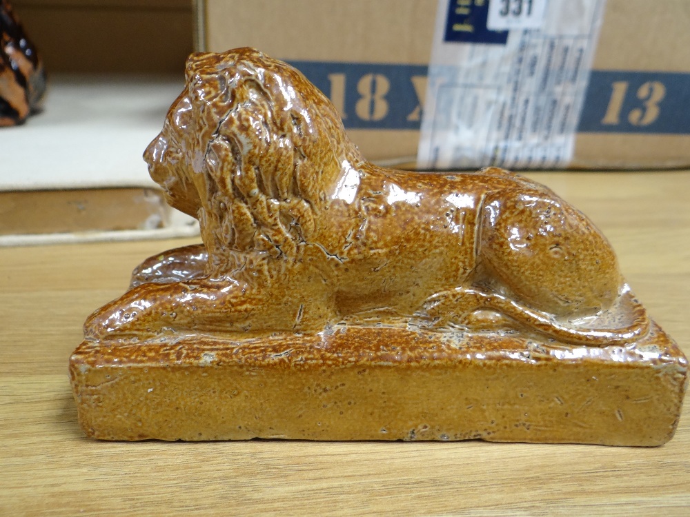 THREE SALTGLAZED POTTERY LIONS of recumbent form on plinths, largest 22cms wide, and a pottery - Image 23 of 23