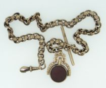 9CT YELLOW GOLD POCKET WATCH CHAIN with t-bar and bloodstone set revolving fob, 42.6gms