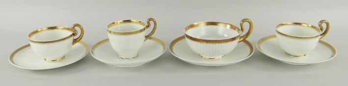 SWANSEA PORCELAIN TEAWARE comprising four French fluted and gilt cups and saucers comprising