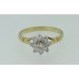 18CT DIAMOND FLOWER HEAD CLUSTER RING, centre diamond surrounded by eight smaller, 2.6grams