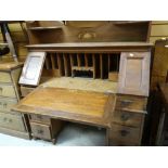 VINTAGE SLOPED BUREAU with bank of drawers and rail top