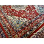 TABRIZ STYLE RUG having blue and ivory medallions and spandrels to a field, multiple guards and