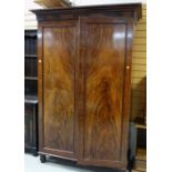 GOOD FLAME MAHOGANY WARDROBE with fitted bank of slides and shoe-drawers