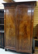 GOOD FLAME MAHOGANY WARDROBE with fitted bank of slides and shoe-drawers