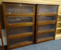 PAIR MAHOGANY FOUR TIER BOOKCASES with glazed sliding doors, 96 x 33 x 146cms