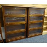 PAIR MAHOGANY FOUR TIER BOOKCASES with glazed sliding doors, 96 x 33 x 146cms