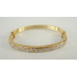 9CT YELLOW GOLD BANGLE with Greek Key design decoration, 9.6grams