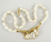 MOTHER-OF-PEARL & FRESHWATER PEARL NECKLACE, the clasp stamped 14k, 26.6.grams overall