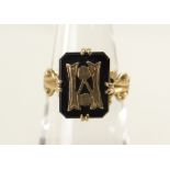 9CT GOLD BLACK ONYX MOURNING RING, 2.9 grams.