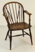 19TH CENTURY ELM WINDSOR ARMCHAIR with spindle back and turned legs