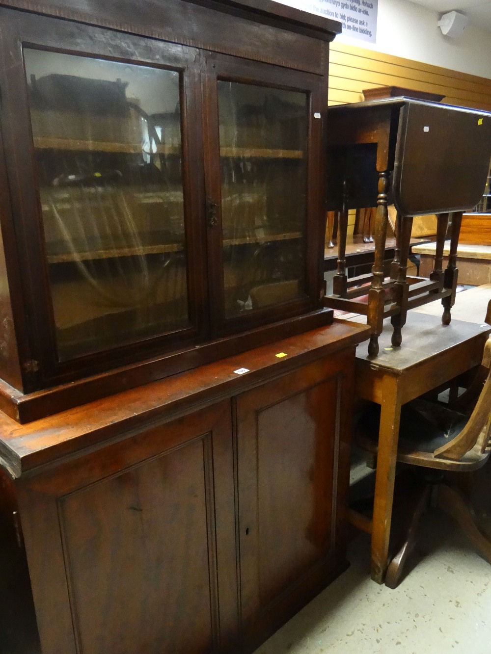 MAHOGANY CABINET ON BOOKCASE (a marriage), and an oak Sutherland table (2)