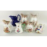 WELSH POTTERY JUGS four Cambrian brown printed jugs, sporting birds, three other Welsh jugs, one