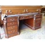 GEORGE II STYLE MAHOGANY PARTNERS DESK having a top laid with leather, arrangement of drawers and