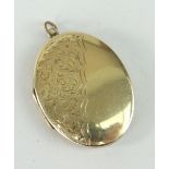 9CT YELLOW GOLD OVAL LOCKET, scroll engraved, 12.5gms