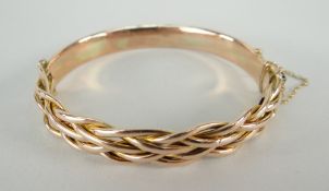 9CT YELLOW GOLD HINGED BANGLE of basket weave design, 13.6gms