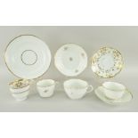 SWANSEA PORCELAIN comprising gilt and white trios, cups and saucers, two with moulded borders (