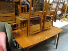 MID CENTURY TEAK EXTENDING DINING TABLE & FOUR CHAIRS together with a rectangular coffee table en