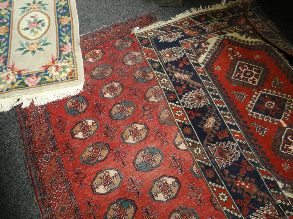 THREE SMALL RUGS including Afghan Teke rug, largest 234 x 120cms