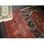THREE SMALL RUGS including Afghan Teke rug, largest 234 x 120cms